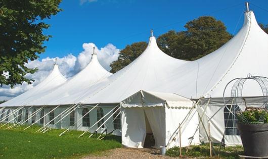 a row of portable restrooms placed outdoors for attendees of a special event in Rosedale MD